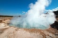 Excelsior Geyser in the Midway Geyser Basin next to the Firehole River in Yellowstone National Park in Wyoming Royalty Free Stock Photo