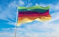 Excemasle gender flag waving in the wind at cloudy sky. Freedom and love concept. Pride month. activism, community and freedom