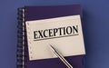 EXCEPTION - word word on a white sheet with a pen on the background of a purple notepad