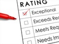 Exceptional check box with red pen over rating survey Royalty Free Stock Photo