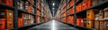 An exceptionally long repeating row of bright orange cardboard boxes stacked in a vast industrial warehouse storage facility Royalty Free Stock Photo