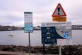 Excessive warning signage at seaport, Plymouth England.