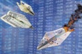 Exchange rate illustration. Strong dollar and euro rate hits rouble like one war paper plane hits another. Dollar vs ruble. US dol Royalty Free Stock Photo