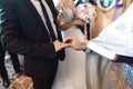 The exchange of rings during an Orthodox wedding, the priest wears the ring bride and groom, wedding day, the church Royalty Free Stock Photo