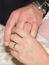 Exchange of Wedding Rings ahnd in hand Royalty Free Stock Photo