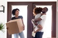 Excited African American family moving to new house Royalty Free Stock Photo