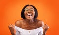 Excited African American Lady Gesturing Yes Standing Over Orange Background