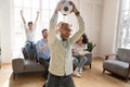 Excited African American man celebrating favorite football team goal Royalty Free Stock Photo