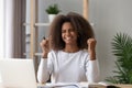 Excited African American pupil satisfied with grade Royalty Free Stock Photo