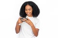 Excited African American woman playing mobile games Royalty Free Stock Photo