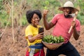 african farmers checking a phone see exciting news