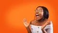 Excited Afro Girl Shouting Standing Over Orange Studio Background, Panorama