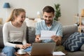 Excited couple screaming with joy reading good news in letter Royalty Free Stock Photo