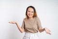 excited asian woman with two hands palm up