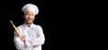Excited Baker Posing With Dough Rolling Pin Over Black Background Royalty Free Stock Photo