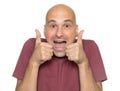 Excited bald man showing thumbs up. Isolated Royalty Free Stock Photo