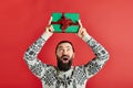 excited bearded man in winter sweater