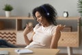 Excited black girl have fun listening to music in headphones Royalty Free Stock Photo