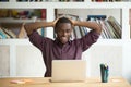 Excited black worker happy with lottery win Royalty Free Stock Photo