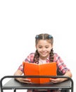 Excited about book ending. Personal attitude determines success. Acquiring knowledge. Small girl with book sit at desk
