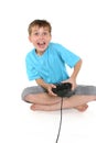 Excited boy playing a computer game Royalty Free Stock Photo