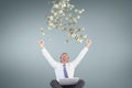 Excited business man looking at money rain against blue background Royalty Free Stock Photo