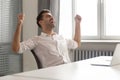 Excited businessman celebrating business success achievement, shouting Royalty Free Stock Photo