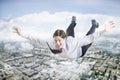 Excited Businessman Flying In The Clouds Royalty Free Stock Photo
