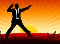 Excited Businessman on Sunset Background