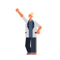 Excited businesswoman holding raised arm business woman standing pose celebrating success concept female office worker
