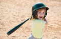 Excited child playing Baseball. Batter in youth league getting a hit. Boy kid hitting a baseball. Royalty Free Stock Photo