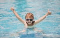 Excited child relax in summer swimming pool. Children play in tropical resort. Family beach vacation. Royalty Free Stock Photo