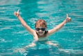 Excited child relax in summer swimming pool. Children play in tropical resort. Family beach vacation. Royalty Free Stock Photo