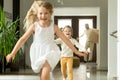 Excited children running on camera, family moving in new house Royalty Free Stock Photo