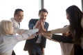 Excited colleagues give high five motivated for success Royalty Free Stock Photo