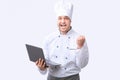 Excited Cook Guy Holding Laptop Gesturing Yes, Studio Shot Royalty Free Stock Photo