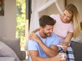 Excited Couple In Bedroom At Home Celebrating Positive Pregnancy Test Result Royalty Free Stock Photo