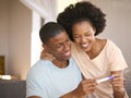 Excited Couple In Bedroom At Home Celebrating Positive Pregnancy Test Result Royalty Free Stock Photo