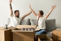 Excited couple glad to move into new home celebrating together