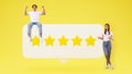 Excited Couple Posing With Five Stars Rating Icon, Yellow Background