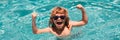 Excited cute little boy in sunglasses in pool in sunny day. Child relax in summer swimming pool. Banner for header, copy Royalty Free Stock Photo