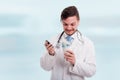 Excited doctor having a surprise in coffee cup