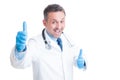 Excited doctor or medic showing double like gesture Royalty Free Stock Photo