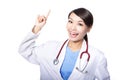 Excited doctor woman finger point