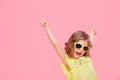 Excited expressive Wonderful happy girl in yellow dress and sunglasses Royalty Free Stock Photo