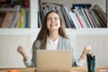 Excited female student feeling euphoric celebrating online win s Royalty Free Stock Photo
