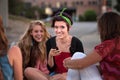 Excited Female Teens Looking at Phone