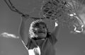 Excited funny kid playing basketball. Closeup child portrait. Funny child sporty face.