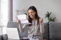 Excited girl holding mail letter feels happy reading great news Royalty Free Stock Photo