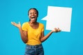 Excited Girl Holding Speech Bubble Shouting Standing On Blue Background